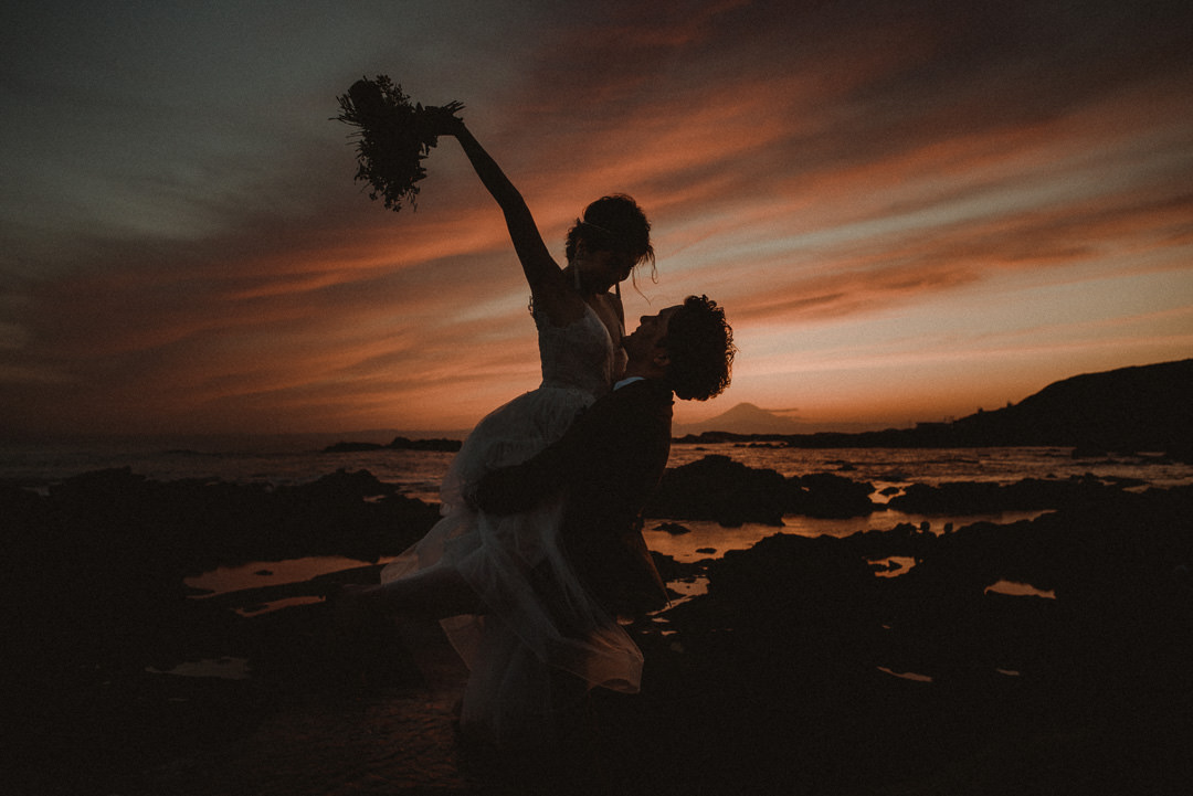 Couple who chose to elope in Japan in a crowded place, but where worlds apart from anyone else.
