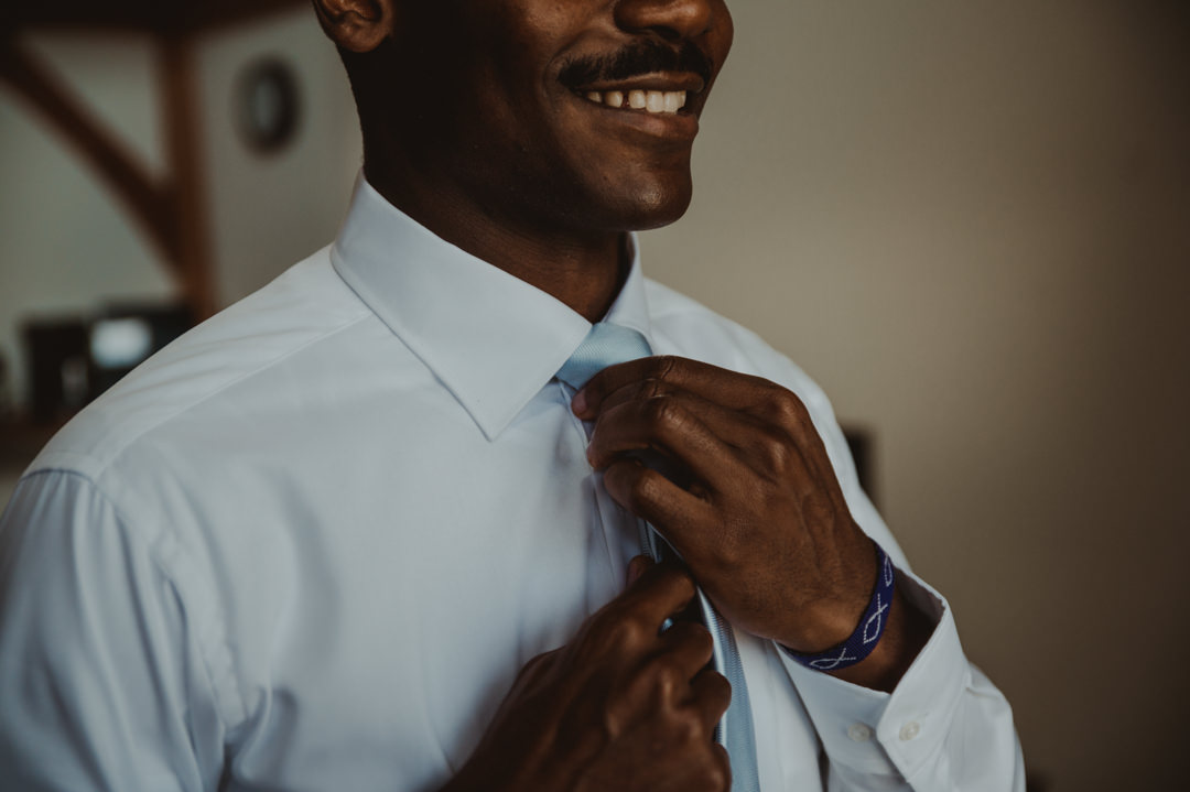 Beautiful elopement in Chiba Japan - Groom ties the tie