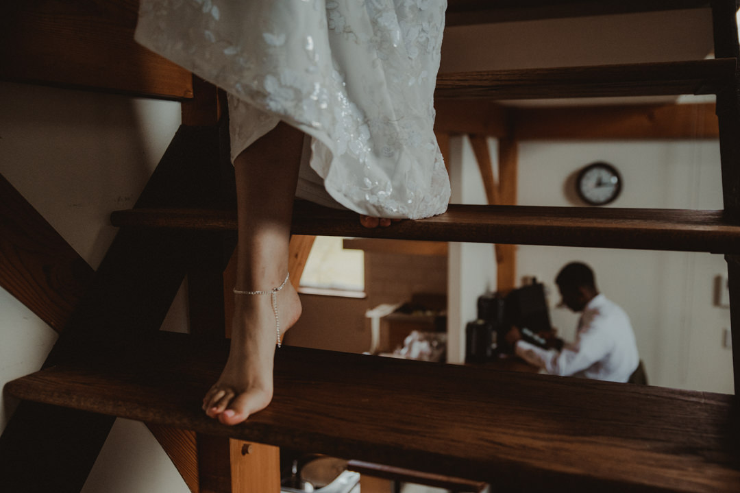 Beautiful elopement in Chiba Japan - Bride going down the stairs
