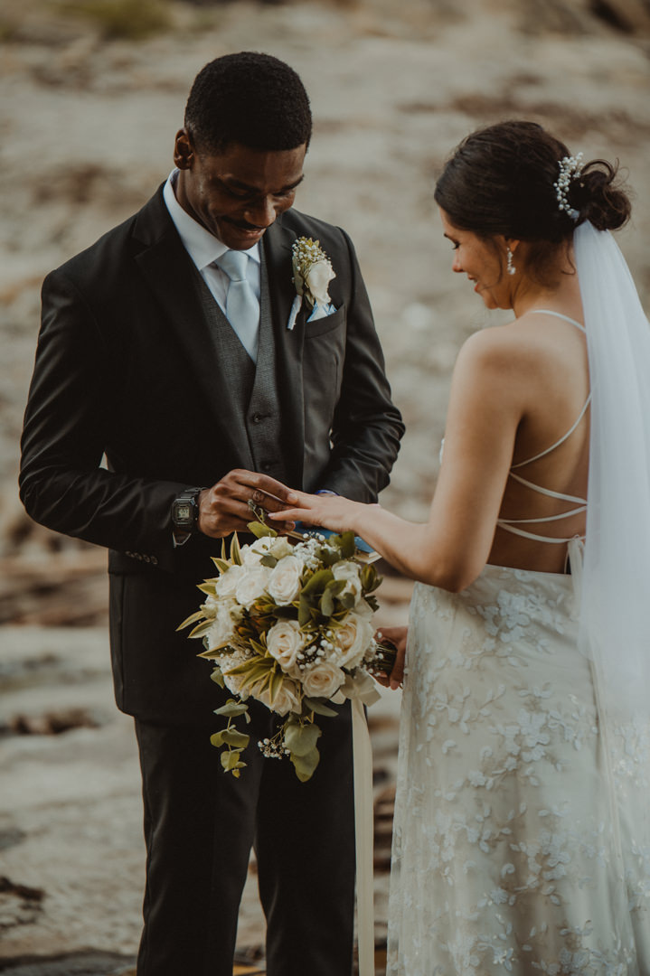 Beautiful elopement in Chiba Japan - Groom puts the ring on the bride