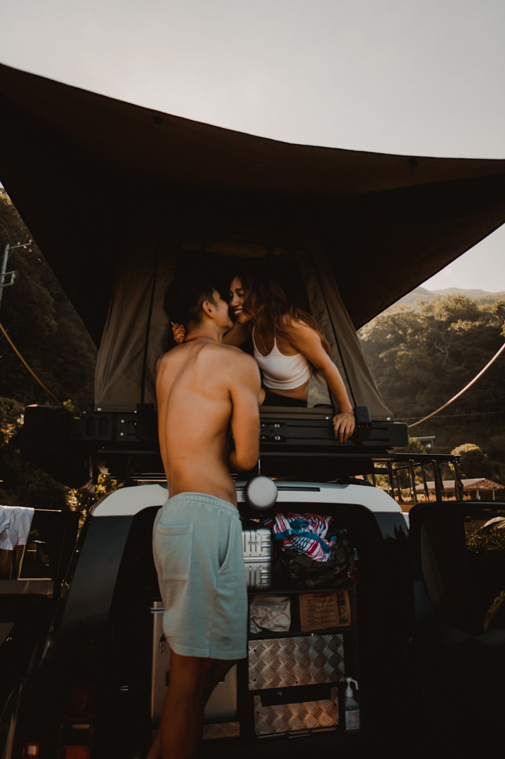 Overland elopement Japan - Roof tent kiss