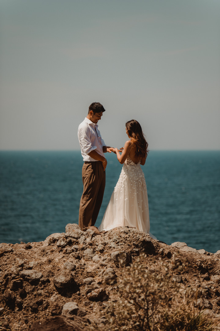 She puts on his ring