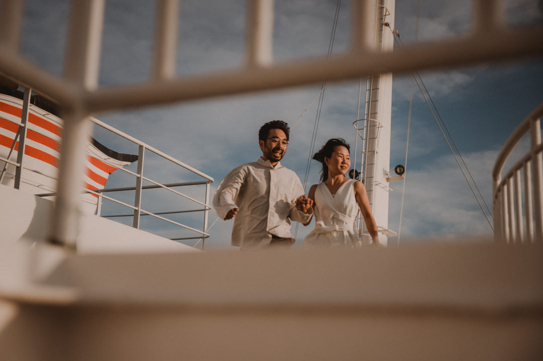 Excited couple running on the ferry