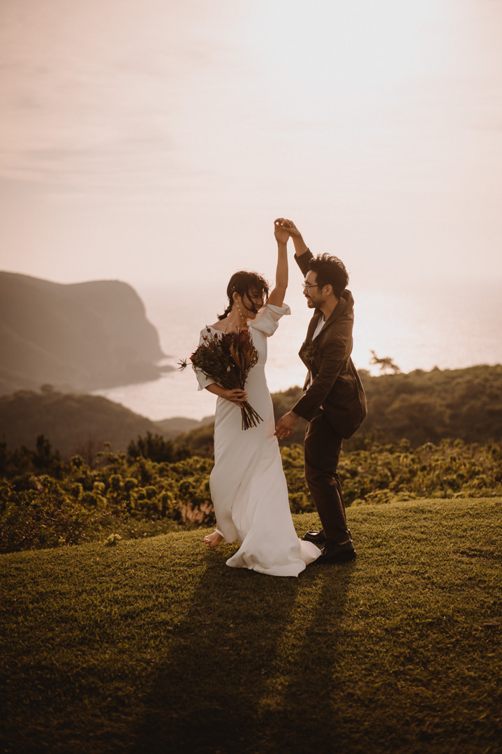 Dancing on the lawn with a breathtaking view. Horses and cows have perfectly trimmed the grass.