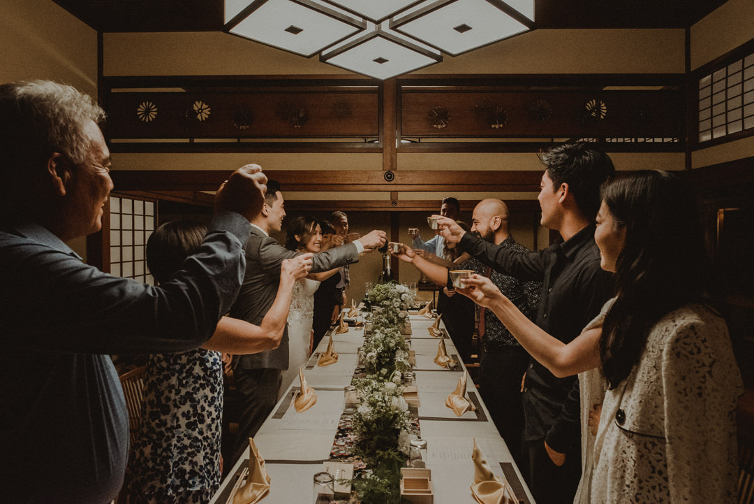 Making a toast at the ryokan elopement
