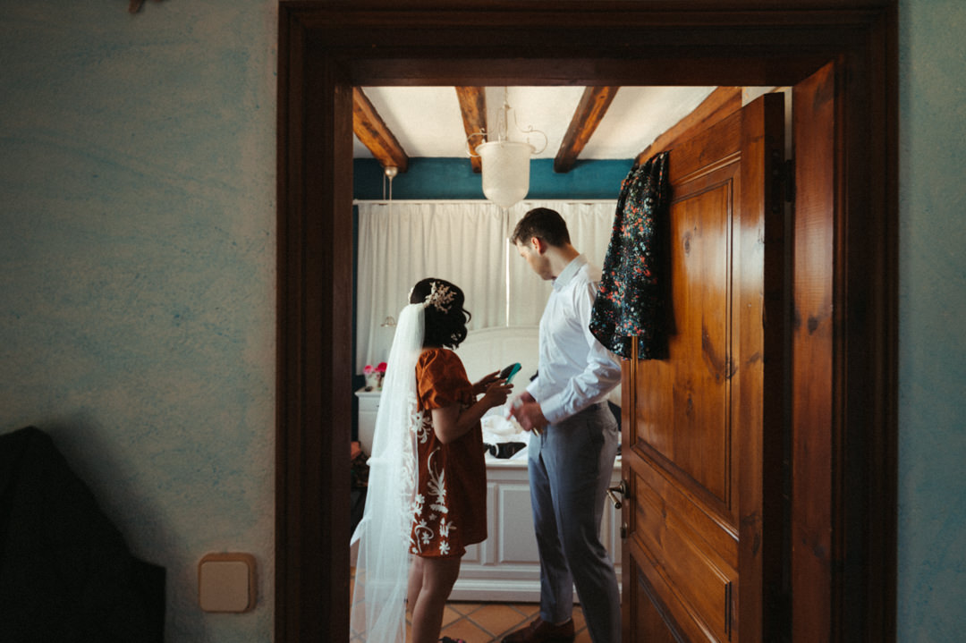 Elope in Barcelona - Couple getting ready for their wedding