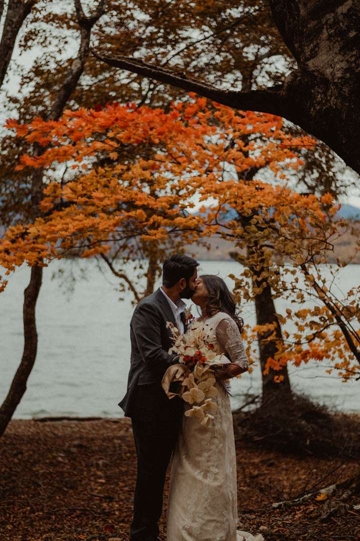 Couple kissing on their wedding fall elopement in Japan