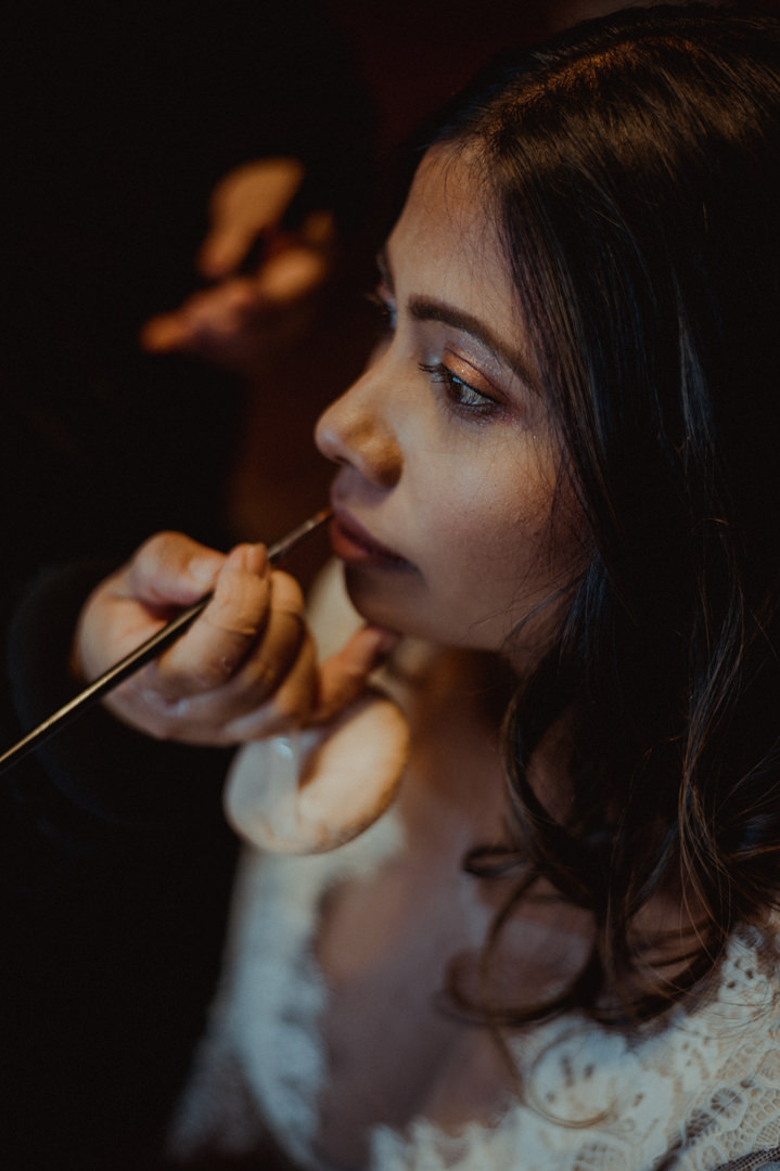 Bride getting her hair and makeup done on her fall elopement in Japan