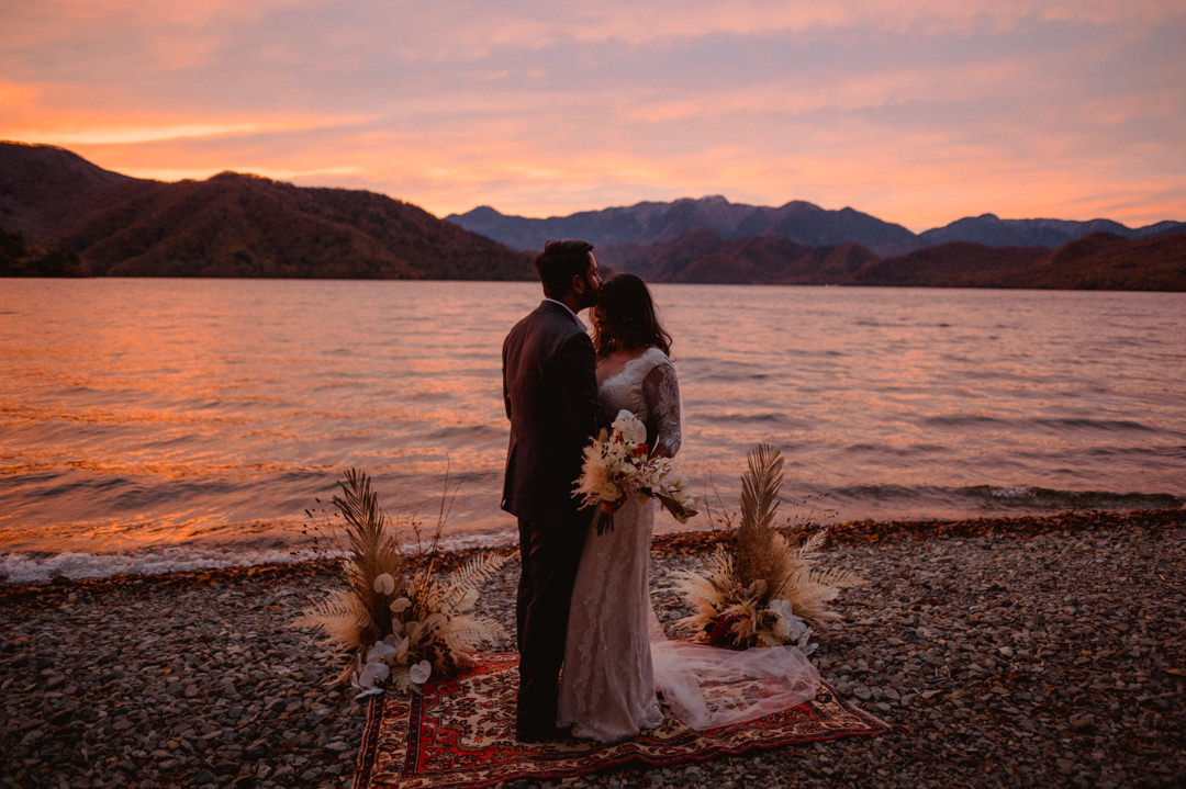 Amazing sunset to wrap wedding ceremony on their fall elopement in Japan