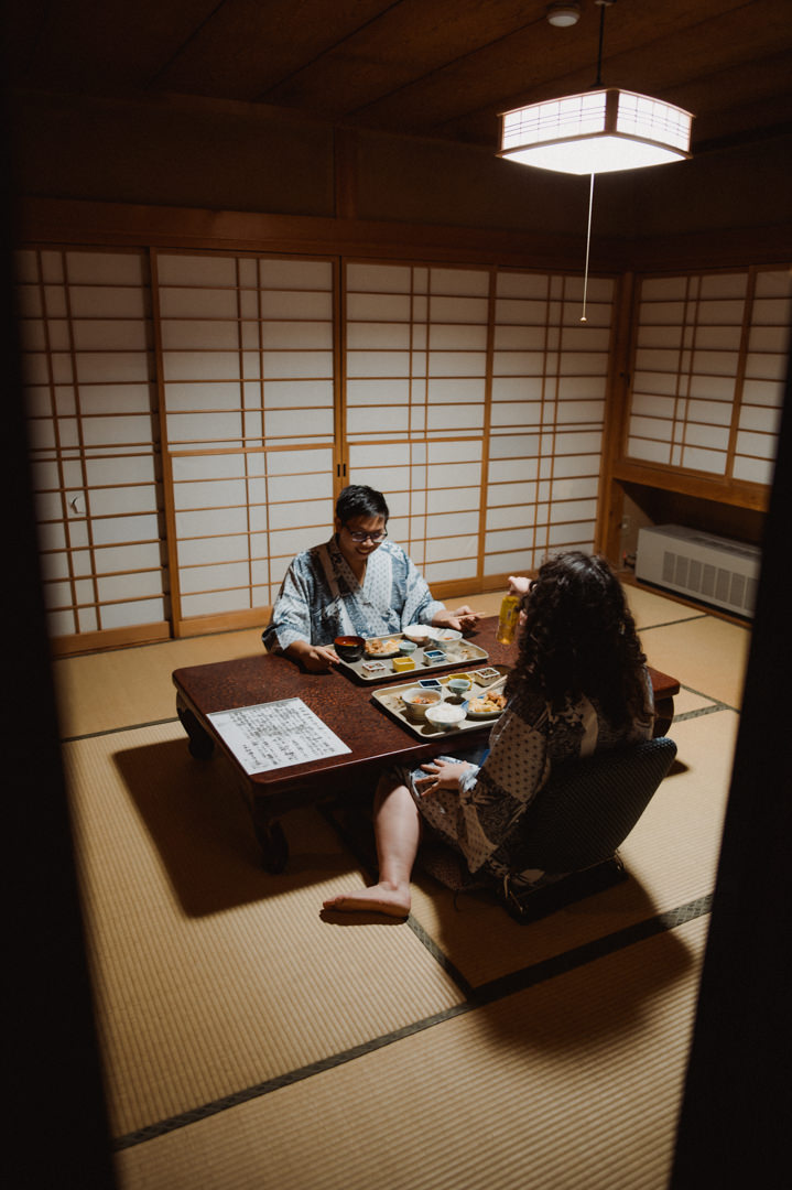 Nagano Ryokan Elopement - Couple having dinner at the ryokan in Japan
