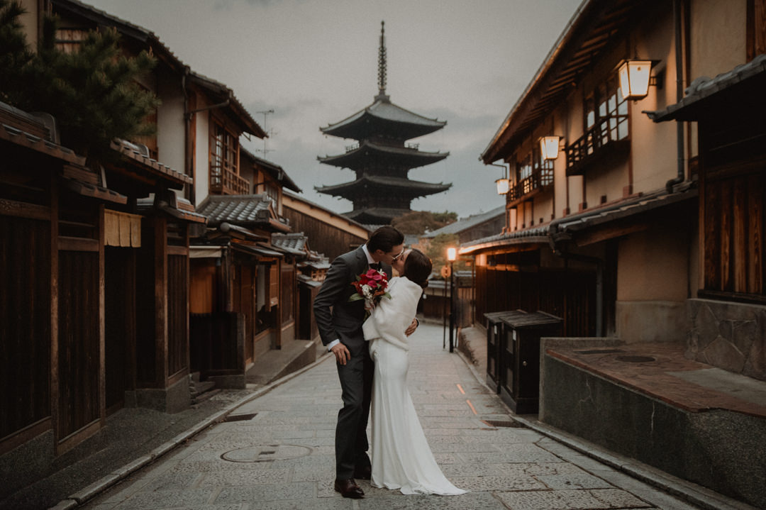 Private Elopement Kyoto - Couple kissing in Yasaka Street