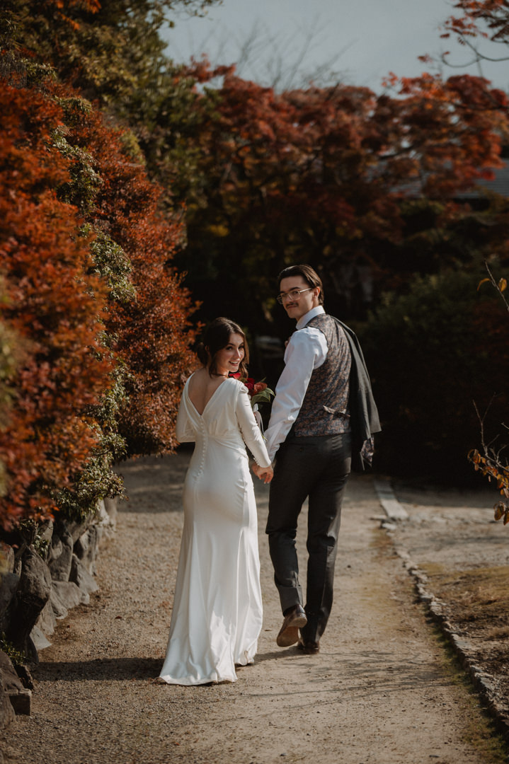 Private Elopement Kyoto - Couple looking back photo