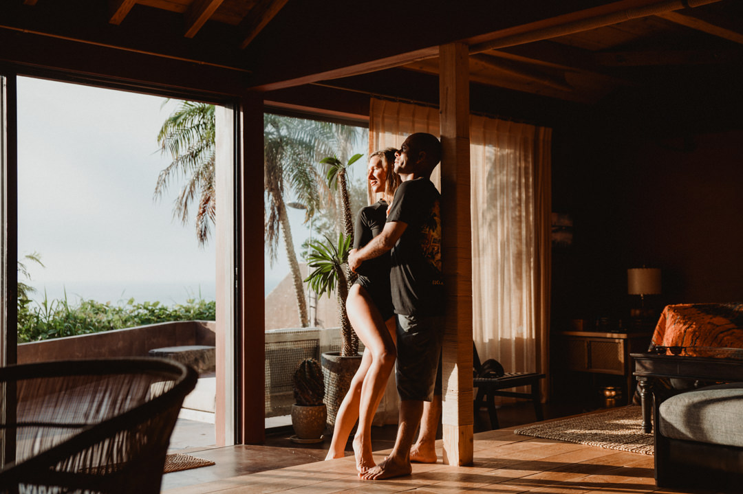 Surfer Elopement in Japan - Couple hugging and watching the sunrise