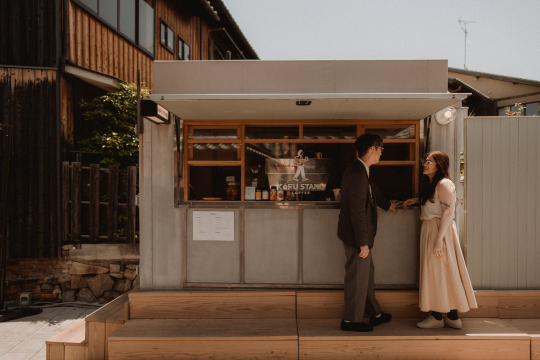 low-key elopement in japan - couple getting coffee