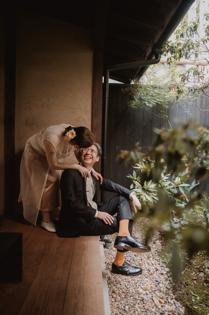 low-key elopement in japan - looking each other at the porch
