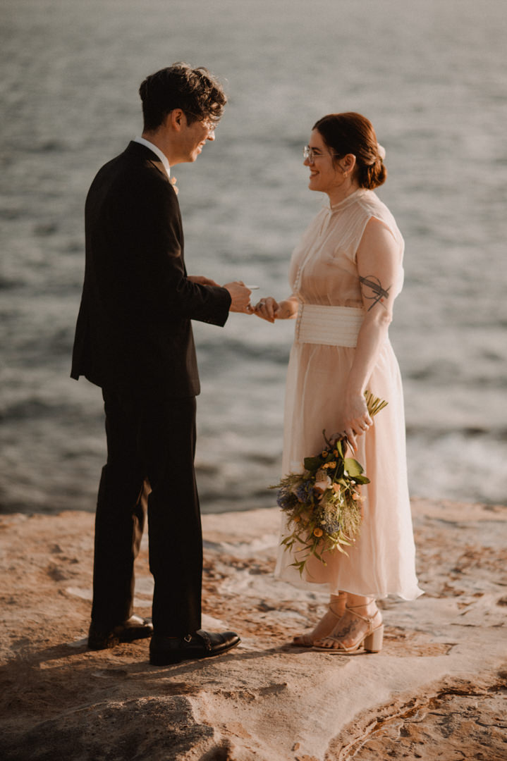 low-key elopement in japan - exchanging vows