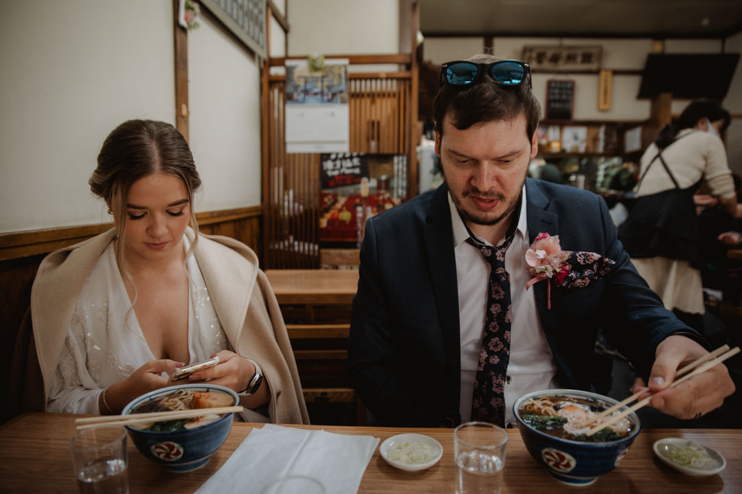tokyo park elopement - eating lunch at local noodle restaurant
