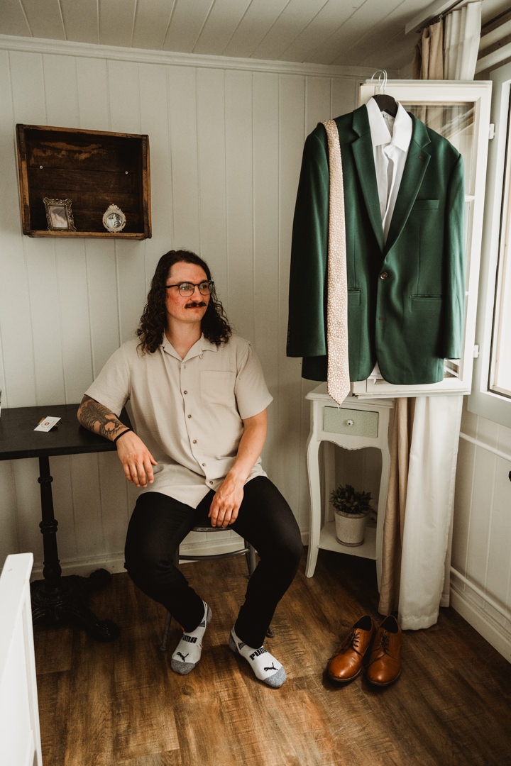 The groom gets ready with his friends Switzerland elopement.