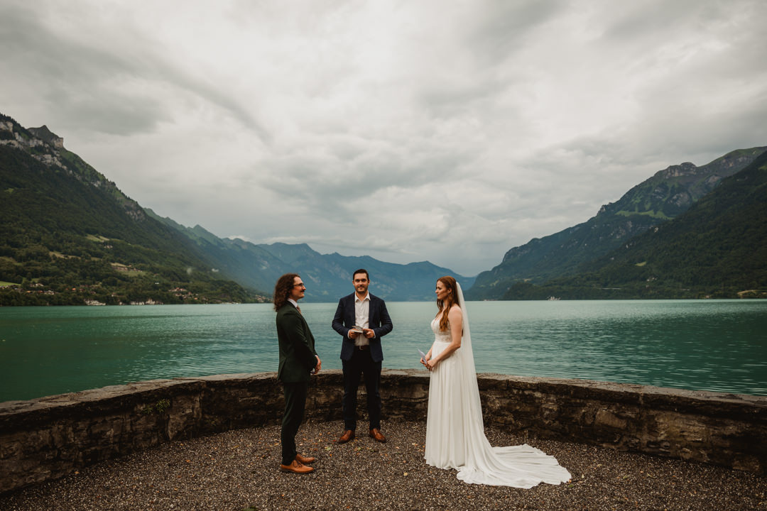 The ceremony by the lake with friends and family Switzerland elopement.