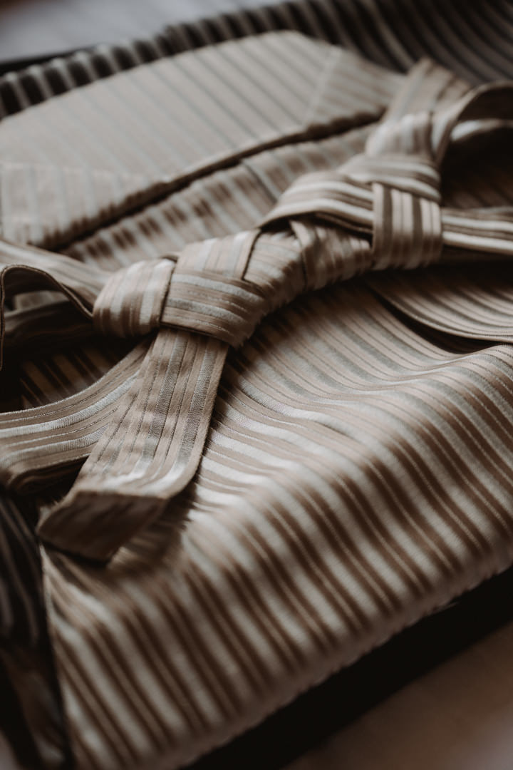 The couple gets ready at their accommodation. Kyoto kimono elopement