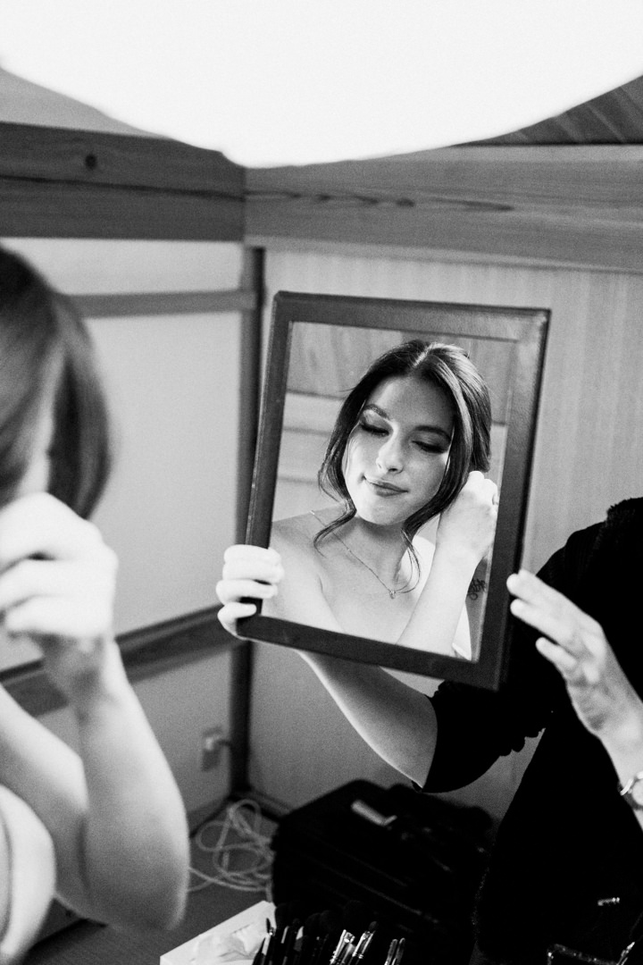 The bride gets ready at their accommodation. Nagano Snow Elopement