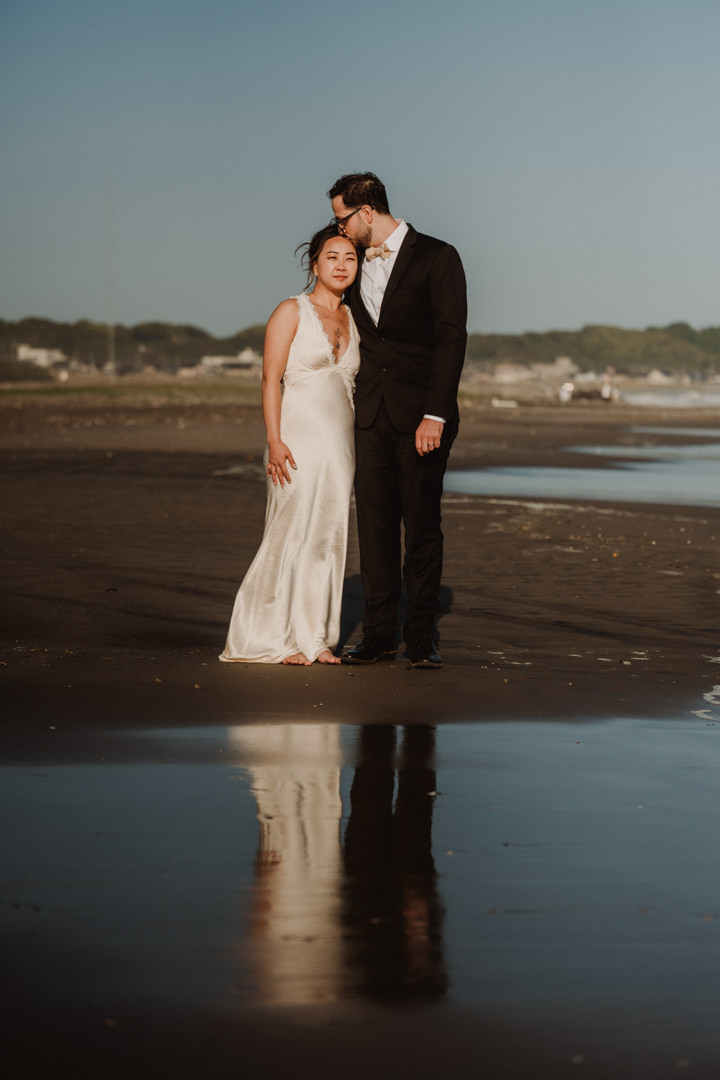 The couple visits Iioka Beach. Ocean Cliff Elopement in Japan.