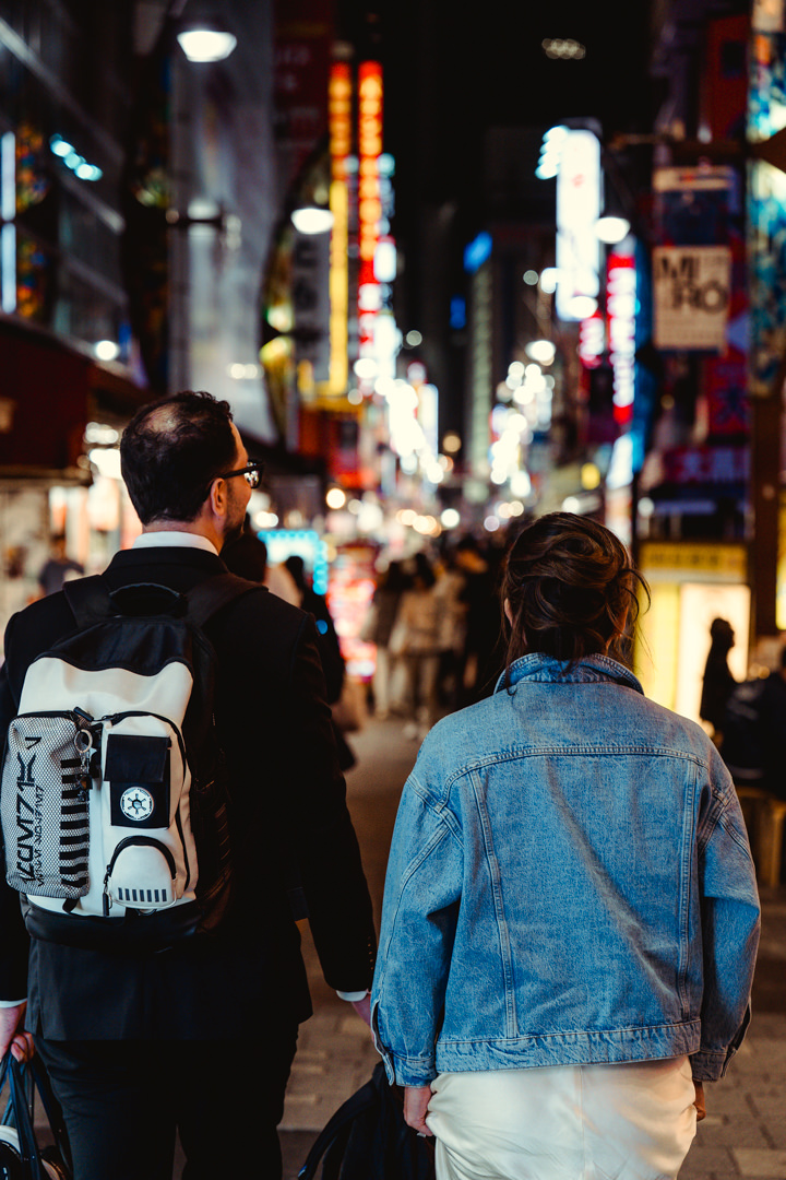 The couple explores Ueno, Tokyo.  Ocean Cliff Elopement in Japan.