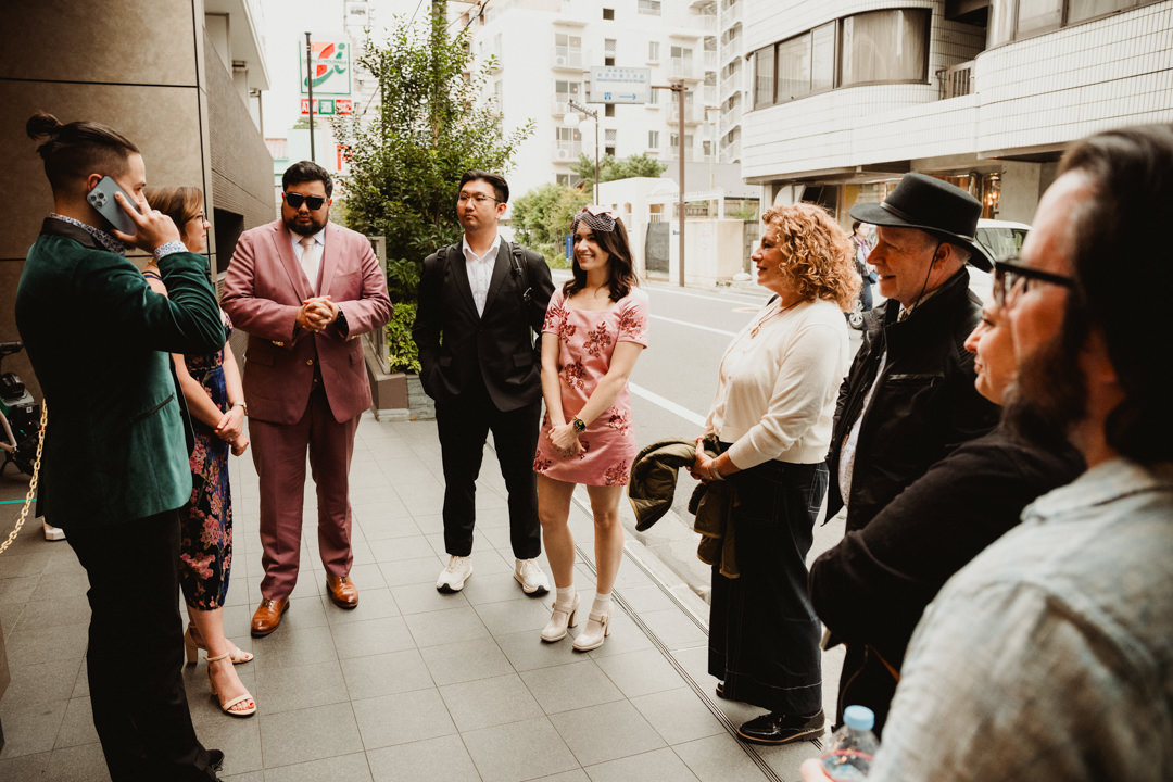 The couple meet their guests, rooftop elopement in Japan