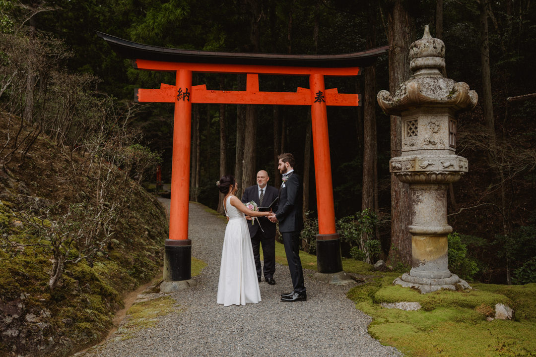 The couple has the ceremony, a private garden elopement in Kyoto 