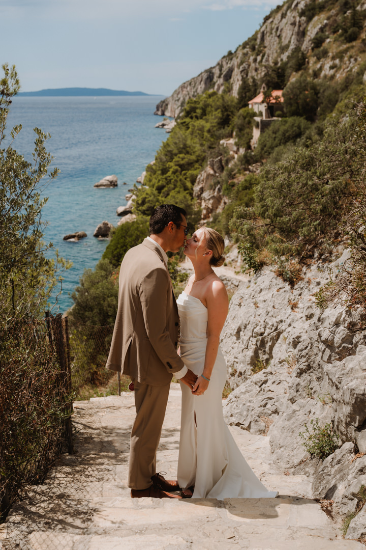 The couple takes a photo shoot on the mountain, an elopement in Croatia